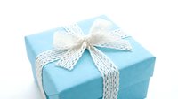 Elegant turquoise gift box with white lace ribbon bow on clean background for celebrations, holidays, birthdays, and special occasions packaging design.