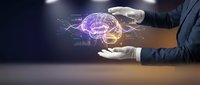 Businessman hands protecting glowing brain with neural networks representing artificial intelligence, innovation and mental health concepts.