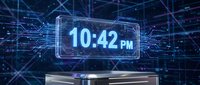 Futuristic holographic digital clock display showing 10:42 PM with glowing blue circuit board patterns and technological interface elements on dark background.