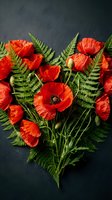 Red poppy flowers arranged with green fern leaves on dark slate background for floral design, botanical decoration and nature-themed projects.