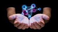 Hands holding glowing network connections with digital nodes and lines representing connectivity, technology innovation, and data transfer concepts.