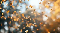 Autumn leaves falling through air with golden bokeh light and blurred background, suitable for seasonal marketing, fall campaigns, and nature-themed designs.