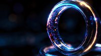 Glowing ring with magical sparkles and light effects on dark background creates mystical atmosphere. Macro photography captures luminous details and reflections.