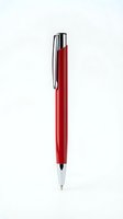 Red ballpoint pen with chrome cap isolated on white background for office supplies and business stationery design projects.