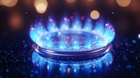 Gas stove burner with bright blue flames creating warm bokeh lighting effect for cooking and kitchen energy concepts.