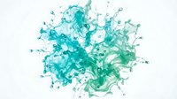 Turquoise and green liquid splash with dynamic droplets and fluid motion on white background for creative design projects.
