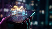 Hand holding smartphone displaying holographic house model with digital grid overlay and glowing particles for real estate technology applications.