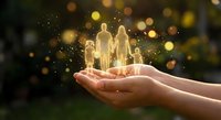 Hands holding glowing family silhouettes with magical sparkles and warm bokeh lights representing protection, care and love for family insurance concept.