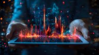 Futuristic holographic city skyline projection emerging from tablet device with glowing orange and blue light effects, showing digital transformation concept.
