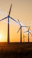Wind turbines generating clean renewable energy at sunset with dynamic light trails showing power flow across golden landscape for sustainable technology concepts.