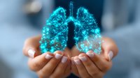 Glowing turquoise hologram of human lungs floating above cupped hands against blurred background, representing medical innovation and respiratory health care concept.