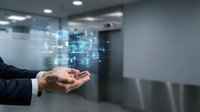Businessman hand presenting holographic digital technology interface with glowing data visualization in modern office environment for innovation concepts.