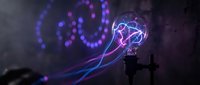 Light bulb with glowing purple and blue electric filaments against dark background with bokeh lights for creative innovation and energy concepts.