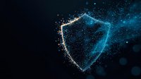 Glowing shield shape formed by luminous particles against dark background with scattered blue light effects and bokeh elements creates protective concept.