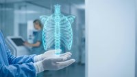 Medical professional displaying holographic human ribcage anatomy in modern healthcare facility for diagnostic imaging and patient education purposes.