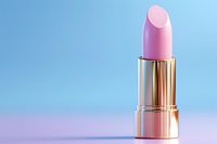 Pink lipstick in luxurious golden metallic case against pastel blue and pink background with soft lighting and reflection, minimal cosmetic composition.