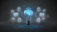 Glowing light bulb with blue brain inside surrounded by floating shopping bags and credit cards on dark background representing innovative commerce ideas.