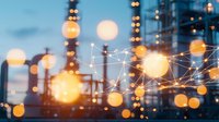 Glowing network connections with bokeh lights against urban skyline at dusk, modern technology concept showing digital transformation and connectivity.