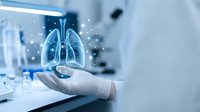 Medical professional displaying holographic lung anatomy model with digital particles in modern healthcare technology environment for respiratory system education.