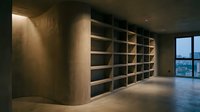 Modern minimalist library interior with empty wooden bookshelves and city view through floor-to-ceiling windows in contemporary office space.