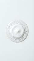 White cream or moisturizer swirl in textured bowl on neutral background, isolated for skincare, cosmetics, beauty product packaging, and dermatology design use.
