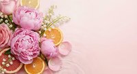 Pink peonies and roses with dried orange slices on soft pink background. Romantic floral arrangement for wedding invitations, greeting cards and feminine designs.