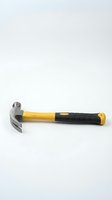 Claw hammer with yellow and black fiberglass handle isolated on white background, essential hand tool for construction and home repair projects.