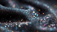 Shimmering cosmic dust particles with colorful bokeh lights against dark background, creating abstract galaxy-like formation.