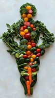 Fresh vegetables and fruits arranged in female silhouette shape on light background. Healthy eating and wellness concept featuring colorful produce and greens.