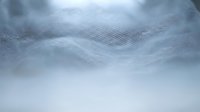 Abstract flowing white fabric texture with soft waves and gentle curves creating elegant minimalist background for luxury design projects.