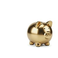 Golden piggy bank on white background isolated for savings and financial planning concepts.