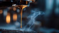 Golden espresso flowing from coffee machine portafilter with rising steam, creating atmospheric mood in dark cafe environment.