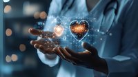 Medical professional hands holding virtual heart hologram with digital health data and vital signs, representing innovative healthcare technology.