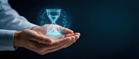 Businessman holding glowing digital hourglass with holographic timer display, representing time management, deadline, productivity, and business efficiency concepts.