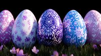Decorated Easter eggs with intricate floral patterns in purple and blue hues arranged on spring grass with delicate pink flowers, festive holiday celebration.
