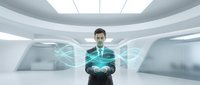 Young businessman in dark suit holding glowing holographic data visualization in modern futuristic white interior office space for technology presentations.