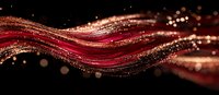 Flowing red and gold glowing waves with sparkles and light particles on black background create magical abstract motion effect for luxury designs.