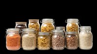 Assorted glass storage jars with airtight lids containing dried pasta, grains, legumes and pantry staples. Isolated on transparent background, ready for kitchen design, print-on-demand products, clipart and sublimation projects.