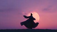 Silhouette of woman in flowing dress dancing against large moon at sunset, fabric billowing dramatically in purple twilight sky, creating mystical atmospheric scene.