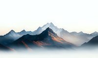 Majestic mountain peaks emerge through morning mist, sunlight casting golden highlights on rocky slopes against pale sky, creating dramatic alpine landscape at sunrise.