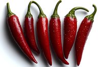Fresh red chili peppers with green stems arranged in row on white background, showing natural water droplets. Suitable for food and cooking designs.