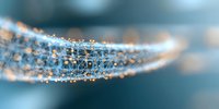 Macro photography of water droplets forming geometric grid pattern on spider web with morning dew, soft blue background creates dreamy atmosphere.