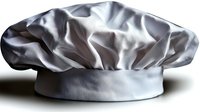 White professional chef toque with pleated crown and classic design on clean background, isolated culinary uniform element for restaurant and cooking industry.