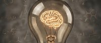 Glowing brain filament inside lightbulb with scientific formulas and laboratory equipment in background representing innovation and creative thinking in research.