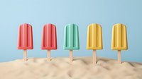Five colorful popsicles on wooden sticks standing in sand against blue background. Summer frozen treats in coral, mint green and yellow colors.