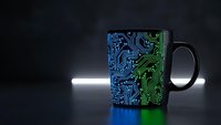Black coffee mug with glowing blue and green circuit board pattern design on dark background with dramatic lighting for tech merchandise.