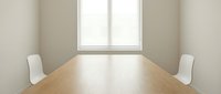 Modern minimalist conference room with wooden table and white chairs in bright office space for business meetings and corporate presentations.
