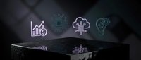 Modern holographic technology display showcasing business analytics, healthcare, justice and innovation icons floating above dark reflective surface for presentations.