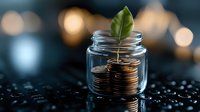 Stacked coins in glass jar with growing green plant leaf symbolizing financial growth, investment and wealth management on dark background with bokeh.