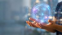 Businessman holding glowing digital network sphere with connected nodes representing global connectivity, artificial intelligence and future technology concepts.